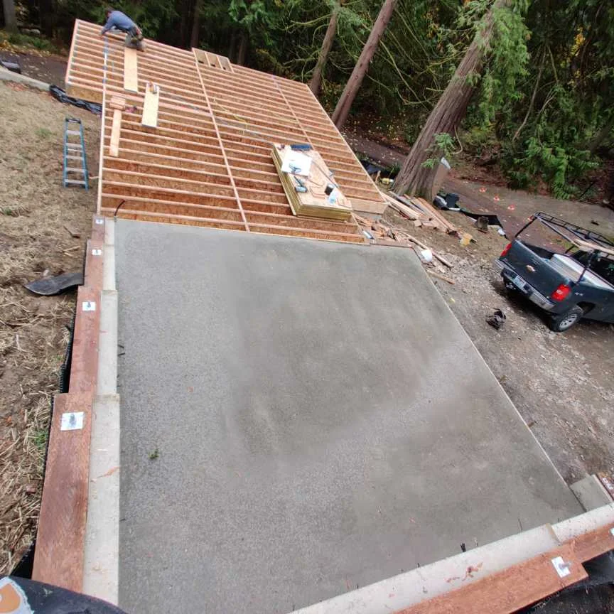Concrete slab and wood floor framing for my second house foundation