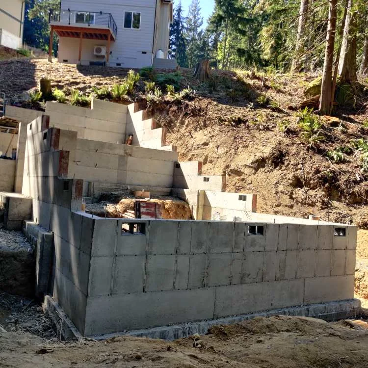 Stepped concrete foundation walls for my second house on a sloped property