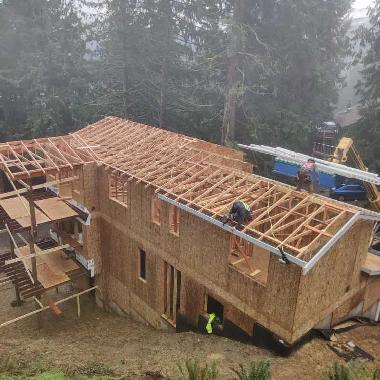Exterior walls and roof trusses being framed on my second house